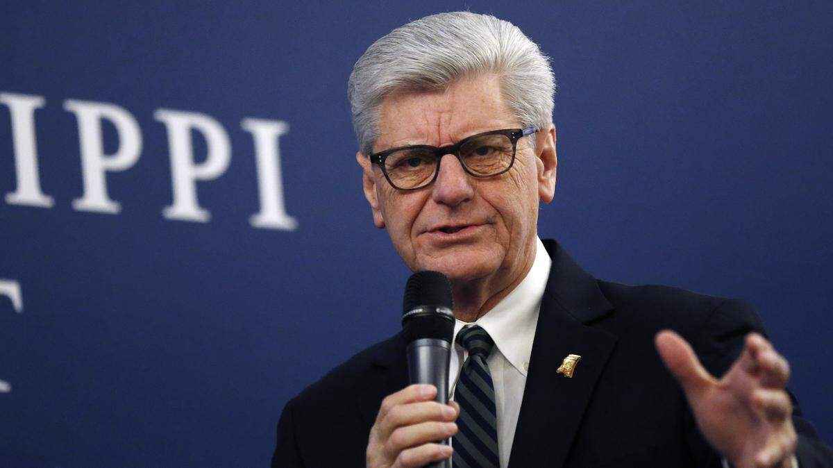Gov. Phil Bryant says he’ll support efforts to reduce the number of Mississippians in prison in the 2019 legislative session during a discussion on criminal justice reform, at the Mississippi Summit on Criminal Justice Reform in Jackson, Miss., Tuesday, Dec. 11, 2018. The meeting was put on by a coalition of groups that favor changes to reduce harshness in the criminal justice system.