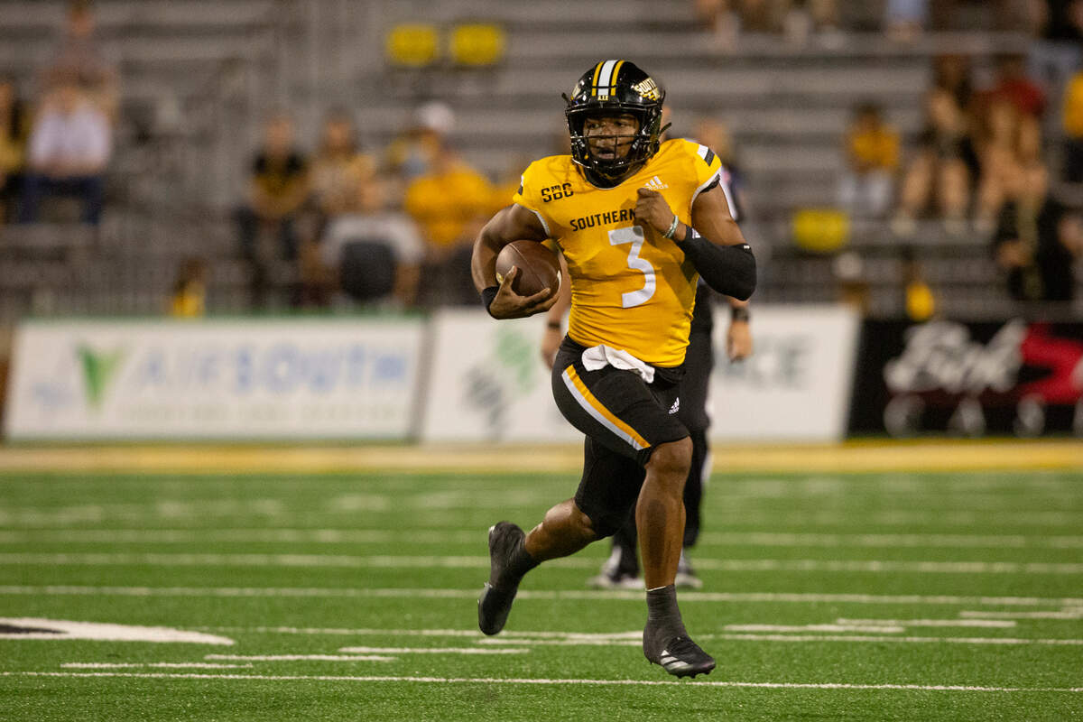Southern Miss Golden Eagles quarterback Ethan Crawford (3) runs the ball during a game between Southern Miss and Arkansas State at M.M. Roberts Stadium in Hattiesburg on Saturday, Oct. 19, 2024.