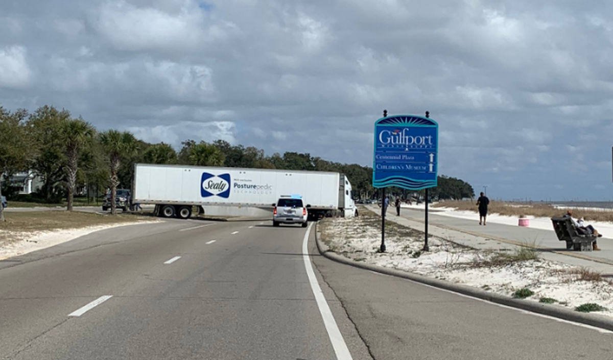 Eastbound lanes of Hwy. 90 are closed due to an 18-wheeler stuck in the sand.