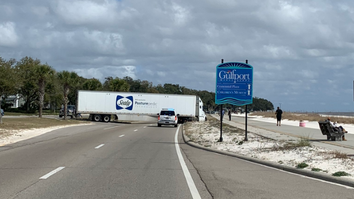 Eastbound lanes of Hwy. 90 are closed due to an 18-wheeler stuck in the sand.