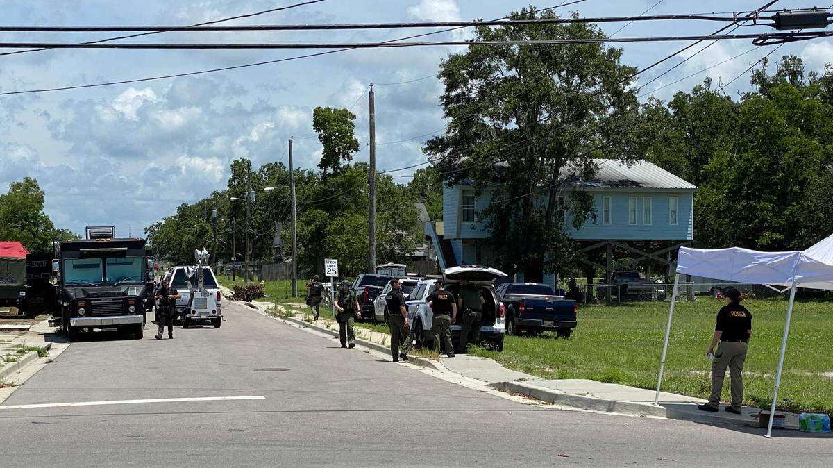 Law enforcement set up operations on Strangi Avenue in Biloxi during a more than 18-hour standoff with a shooting suspect barricaded inside a home on Thursday, June 10, 2021.