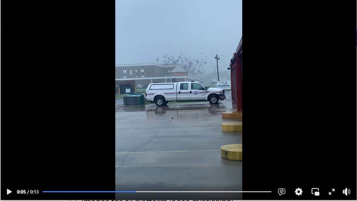 A screen grab from Facebook shows the roof of a hospital in Louisiana being torn off by Hurricane Ida.