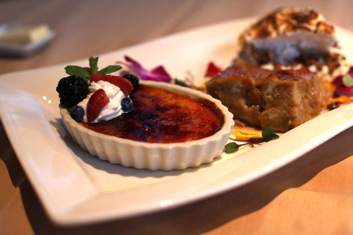 Coconut cremé bruleé, wihte chocolate bread pudding and praline pie at Blue Bayou inside Silver Slipper Casino in Hancock County.