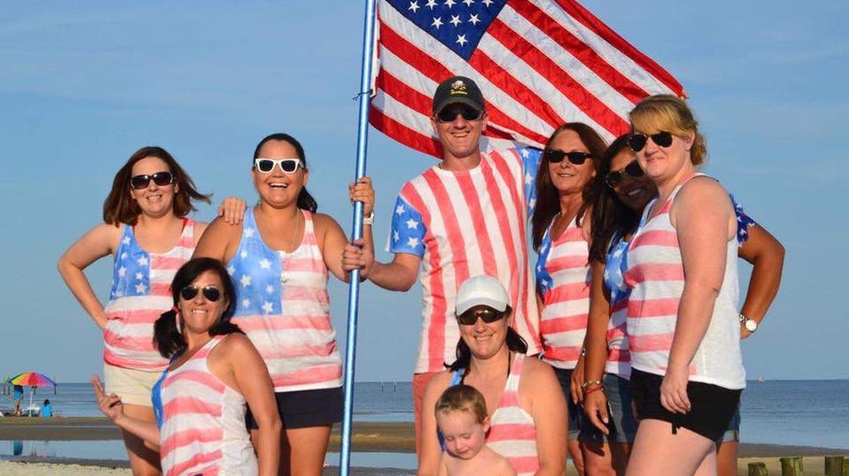 Former Seabee Brad Helsel helps hold up an American flag while he and his family celebrate their love of country on the 4th of July. The Waveland man died after he was assaulted Dec. 3, 2018, while trying to stop a fight after a concert at the Mississippi Coast Coliseum in Biloxi.