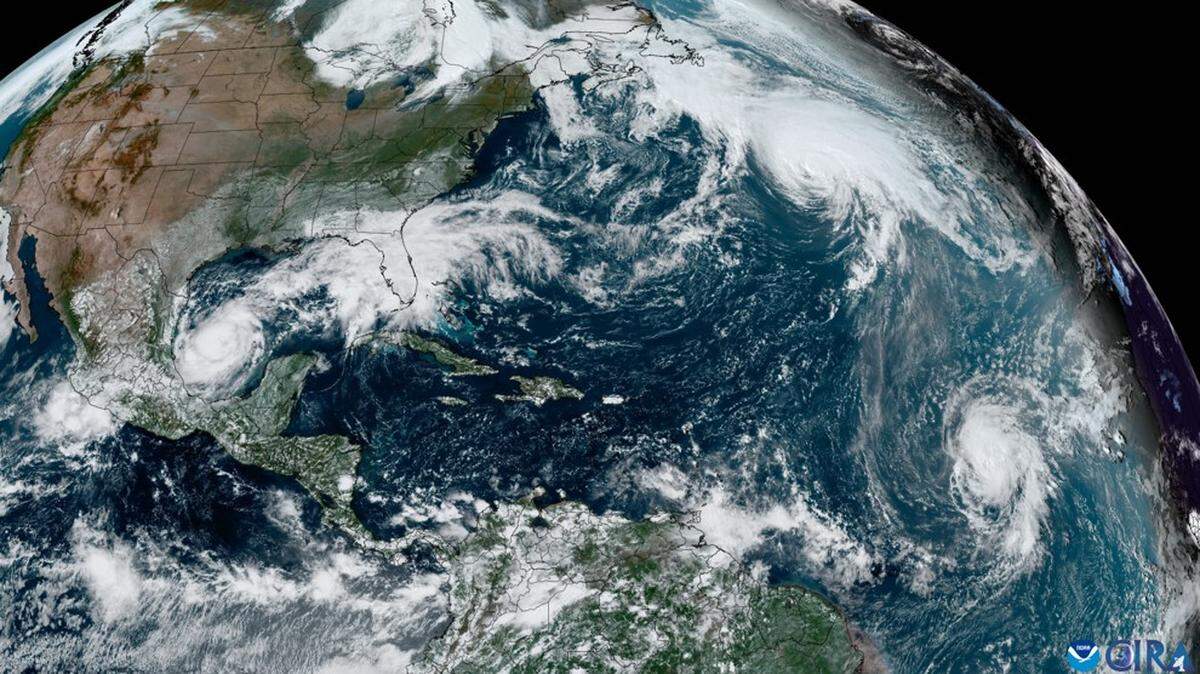A satellite image of hurricanes Milton, Kirk and Leslie on Sunday, October 6, 2024.