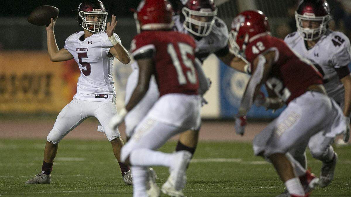 East Central’s Brady Fant prepares to throw a pass during the Biloxi versus East Central football game at Biloxi High School on Friday, Aug. 27, 2021.