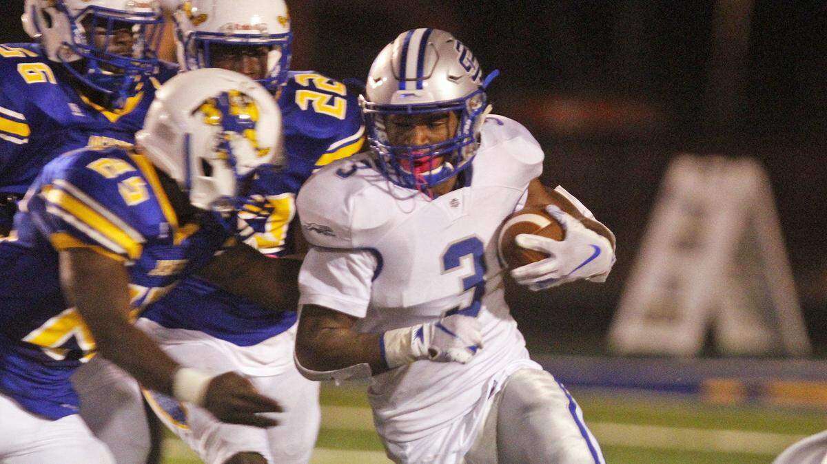Ocean Springs running back Micah Kelly (3) runs with the ball against St. Martin on Oct. 10, 2018, at St. Martin. Kelly has verbally committed to Toledo.