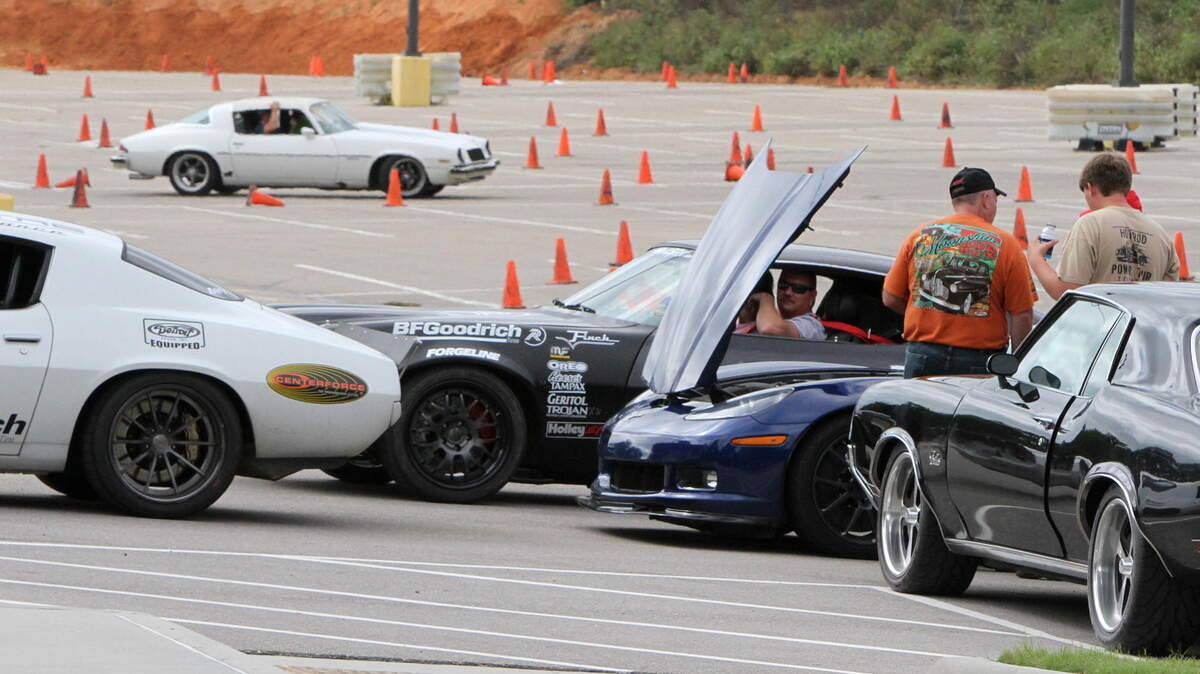 JOHN FITZHUGH/SUN HERALD 
 Cars wait their turn to run through the course on Monday Oct. 5, 2015 at the American Streetcar Promotions' autocross set up at the Mississippi Coast Coliseum and Convention Center in Biloxi for Crusin' The Coast.