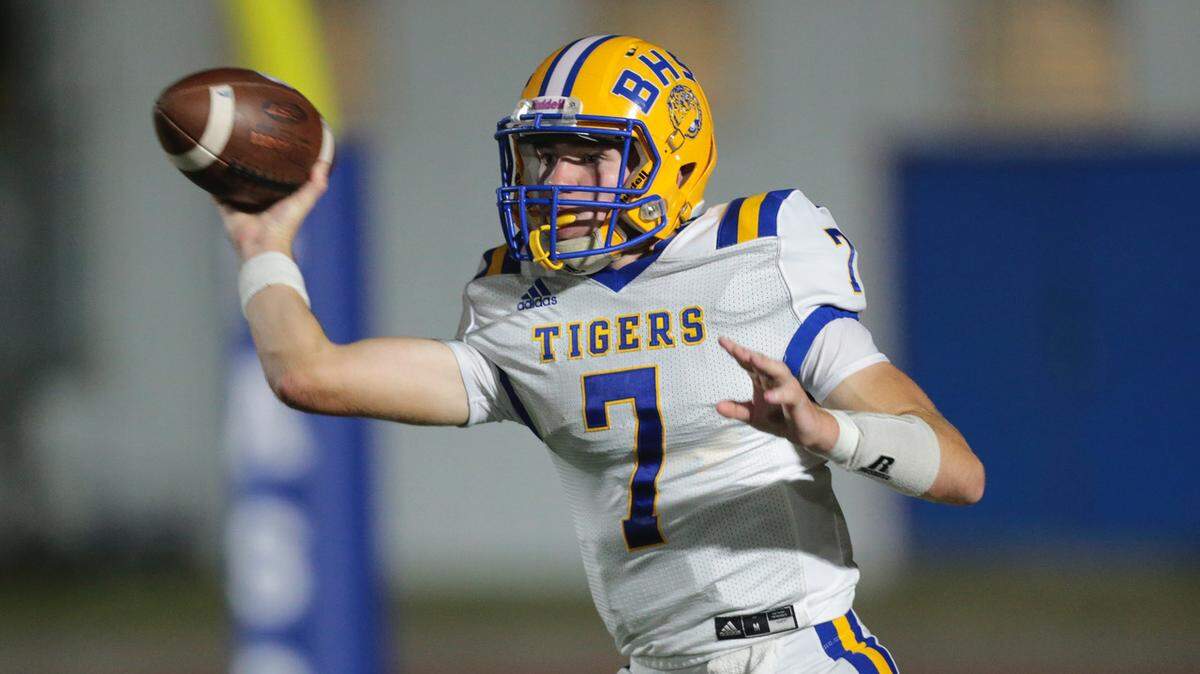 Bay High Josh Peters (7) passes from his own end zone during the game between Bay High and Pass Christian at Pass Christian, Friday, October 4, 2019.