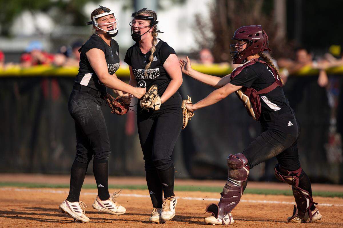 George County Lady Rebels’ softball team celebrates after a play during the 5A 2023 MHSAA Softball Championship game at USM Softball Complex in Hattiesburg on Thursday, May 18, 2023.