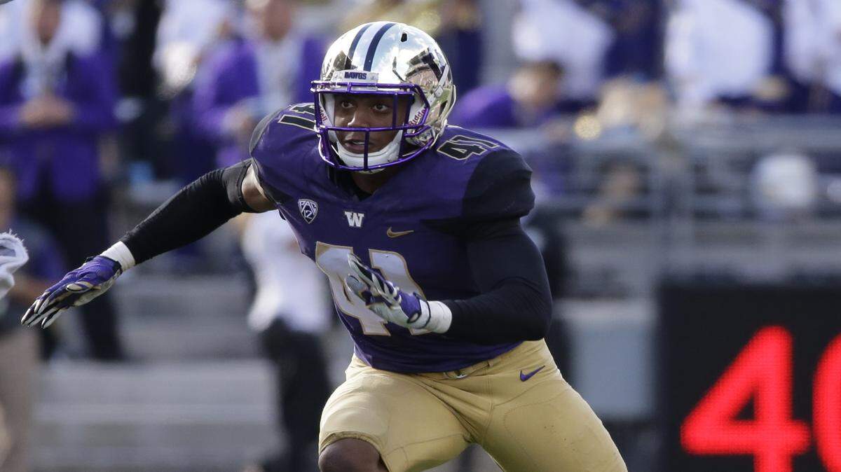 Travis Feeney had three sacks in the 17-12 win at USC this season. (Ted S. Warren/Associated Press)