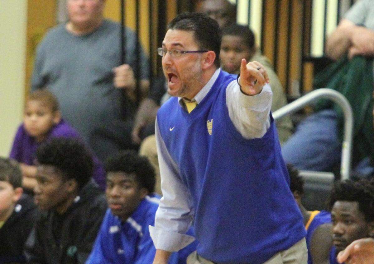 JOHN FITZHUGH/SUN HERALD  St. Martin head coach Charlie Pavlus led his team to a 57-50 win over West Harrison Friday night in Gulfport.