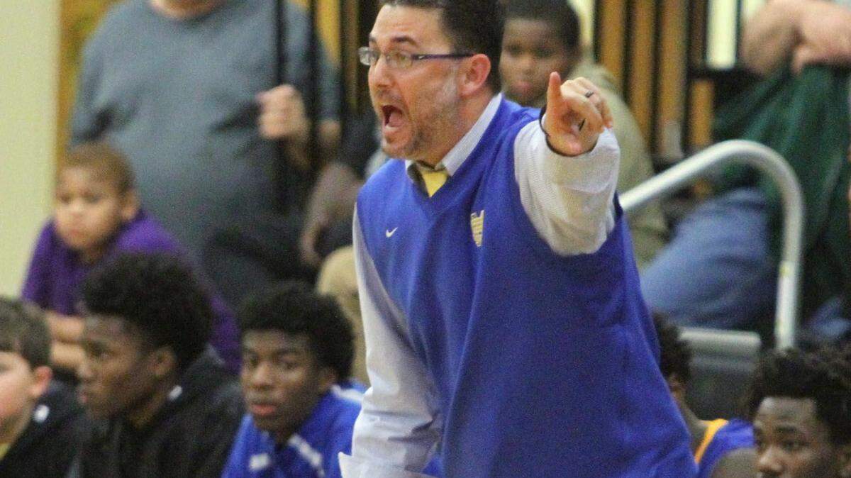 JOHN FITZHUGH/SUN HERALD 
 St. Martin head coach Charlie Pavlus led his team to a 57-50 win over West Harrison Friday night in Gulfport.