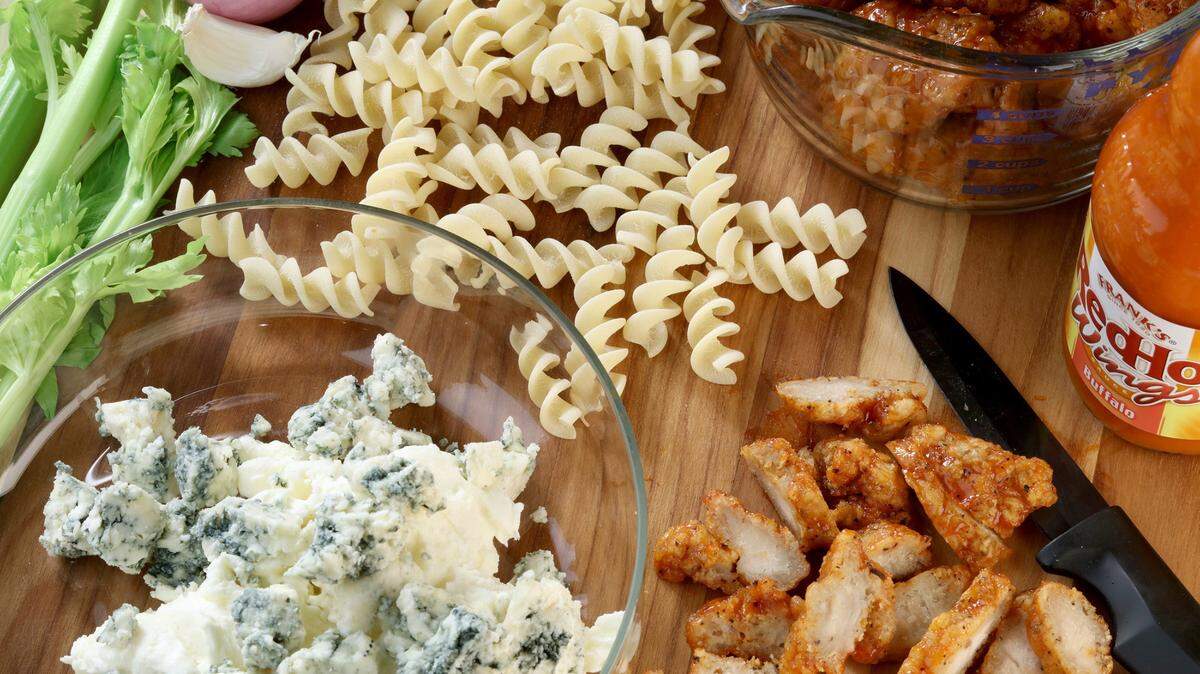 MICHAEL TERCHA/CHICAGO TRIBUNE/TNSOrder Buffalo chicken wings from your favorite spot, chop them and then mix the chicken into your mac with plenty of blue cheese, some sauteed celery for crunch and hot sauce, of course.