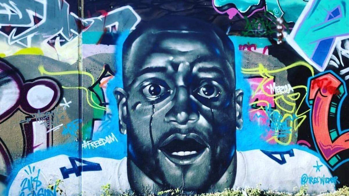 Trey Wilder created a mural in which Cowboys quarterback Dak Prescott portrays an iconic image from Jordan Peele’s award-winning film “Get Out.”
