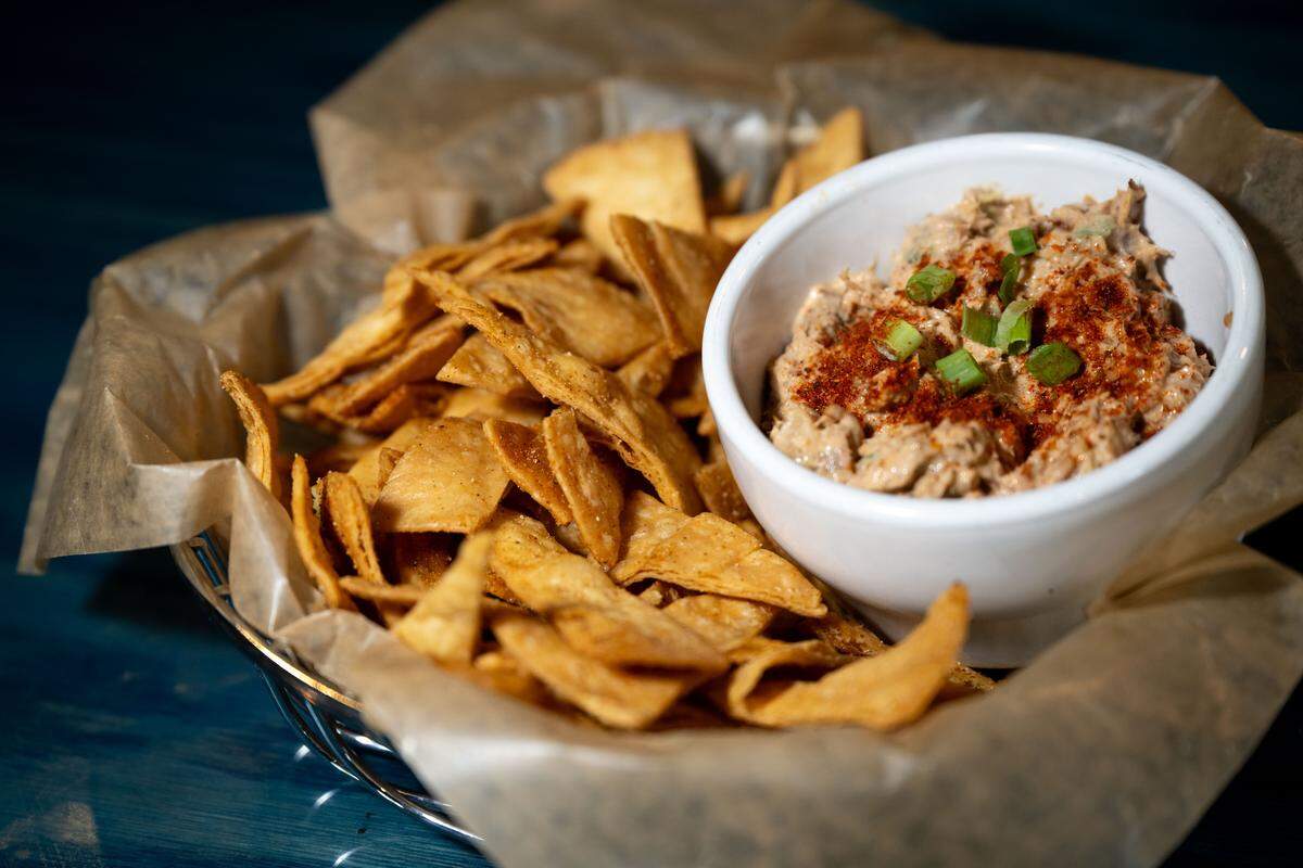 Biloxi bacon dip with tortilla chips at Boonies on the Bayou on Friday, Dec. 5, 2025.