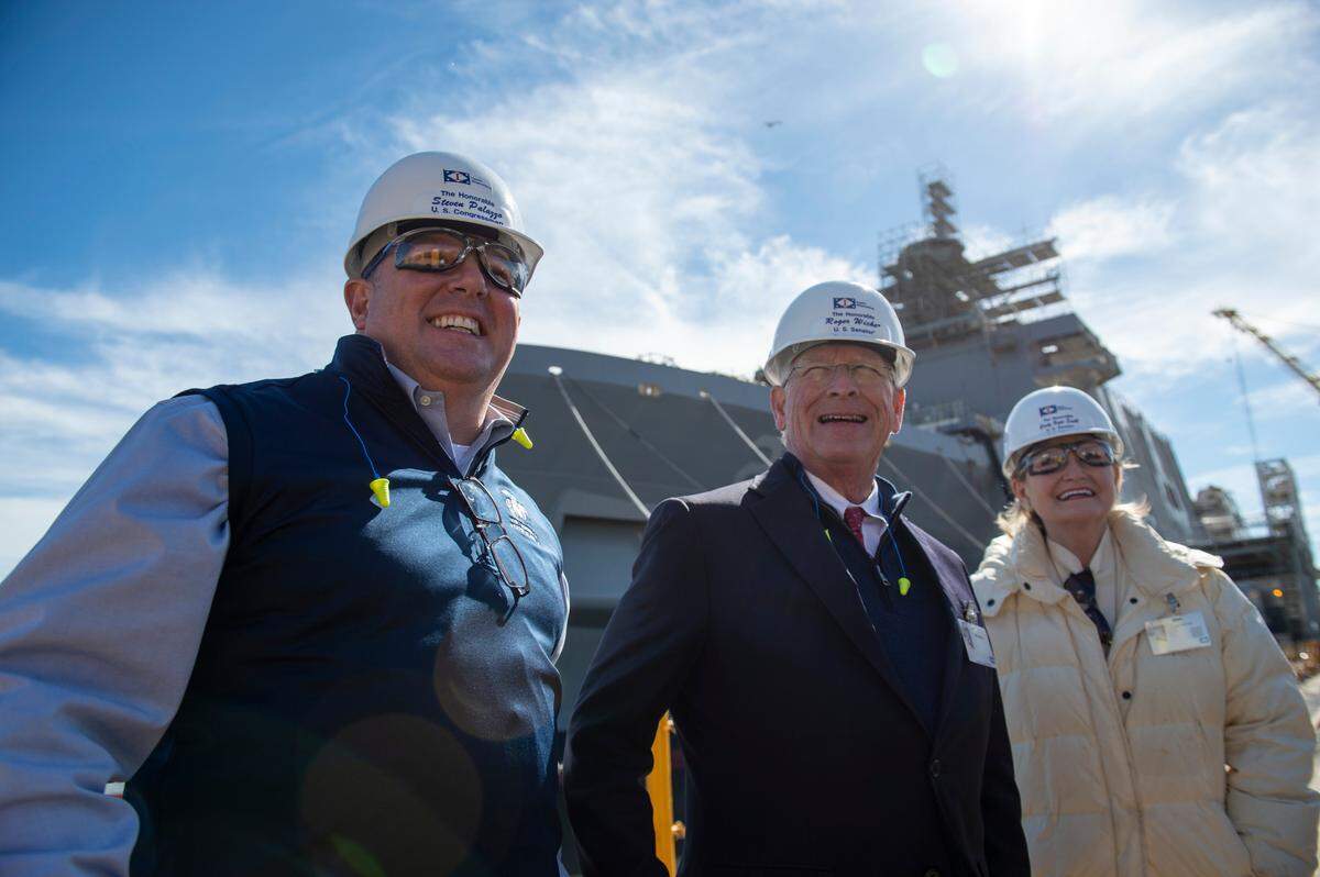 U.S. Rep. Steven Palazzo, left, and U.S. Sens. Rodger Wicker and Cindy Hyde-Smith, right, speak to the press in front of the USS Richard M. McCool Jr. (LPD-29) at Ingalls Shipbuilding in Pascagoula on Wednesday, Jan. 26, 2022.