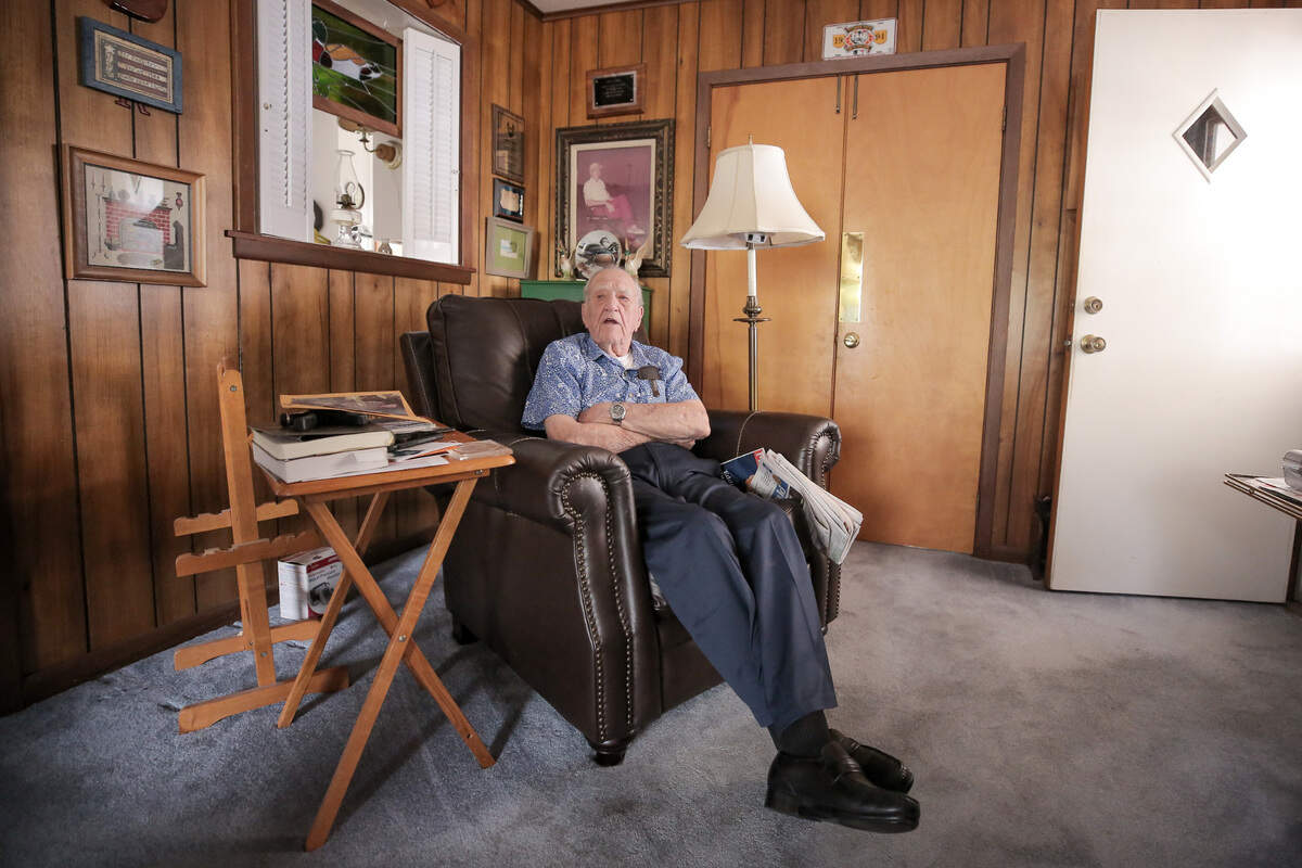 George Roberts, 100, sits in his Gulfport home Sunday, Feb. 28, 2021.