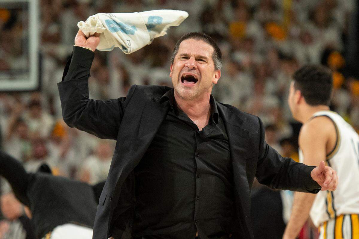 Southern Miss Assistant Coach Juan Cardona celebrates during a game against Louisiana-Lafayette at Reed Green Coliseum on Thursday, Feb. 9, 2023.