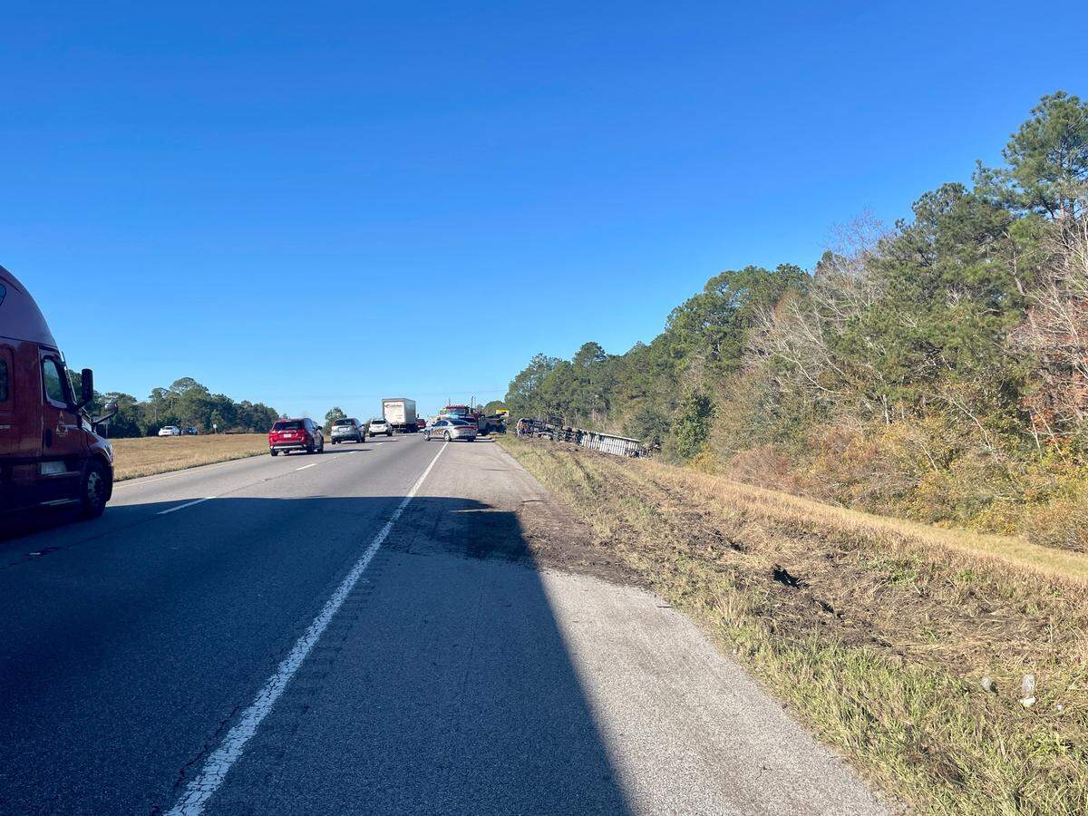 Authorities closed the right westbound lane after an 18-wheeler crashed Monday morning near the Martin Bluff Road overpass.