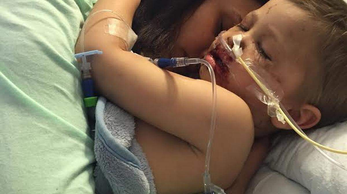 PHOTO COURTESY OF EMILY SAUCIER Emily Saucier and her son, Zander, 3, hug for the first time during his hospital stay.