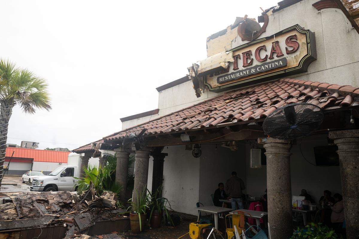 Interior damage can be seen Sunday at Aztecas Restaurant & Cantina after tornadoes struck South Mississippi.