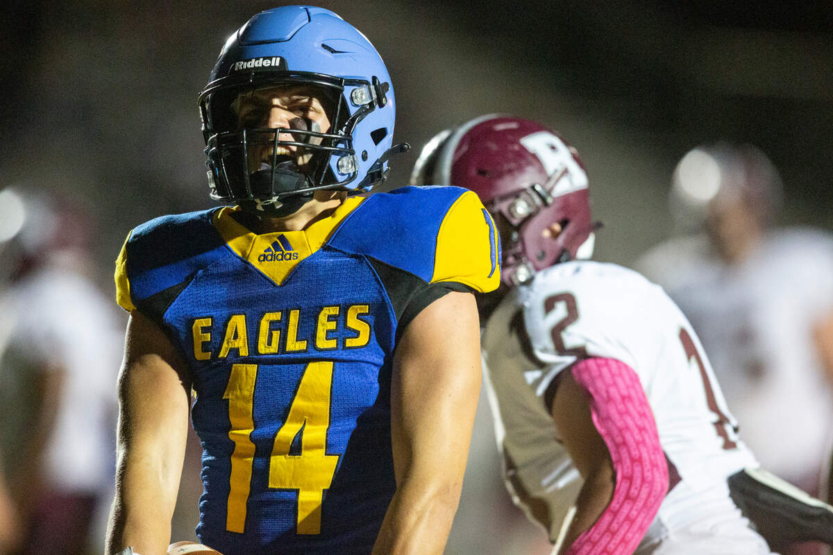 Resurrection quarterback Max Askew celebrates after a touchdown during a game against Richton at Gautier High School in Gautier on Friday, Oct. 14, 2022.