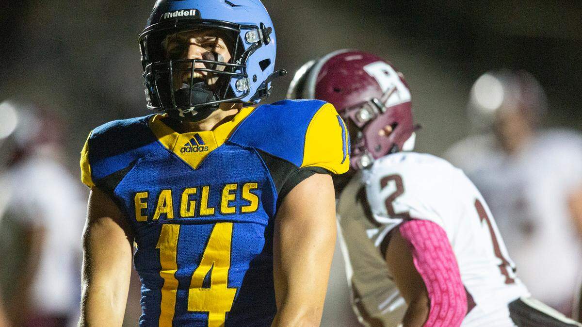 Resurrection quarterback Max Askew celebrates after a touchdown during a game against Richton at Gautier High School in Gautier on Friday, Oct. 14, 2022.
