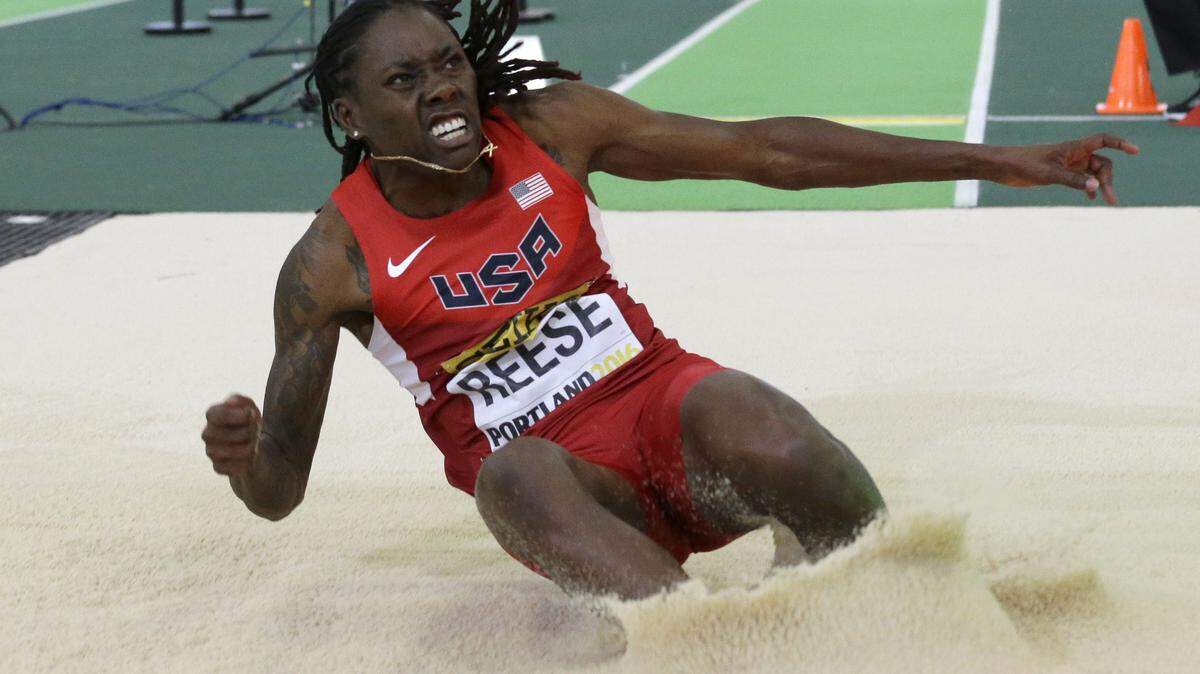 ELAINE THOMPSON/APUnited States' Brittney Reese lands in the sand after a jump in the women's long jump final during the World Indoor Athletics Championships on Friday in Portland, Ore. Reese won the event.