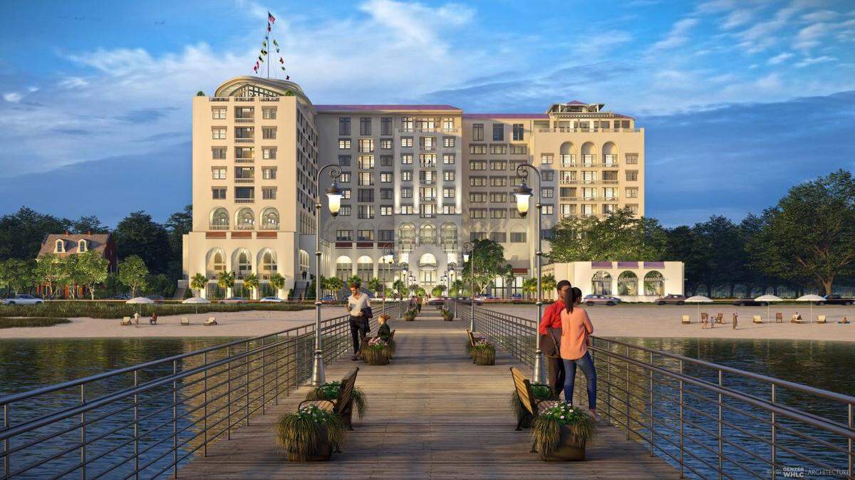 A rendering of the night view shows the proposed Tullis Garden Hotel in East Biloxi from a pier that is part of the project.