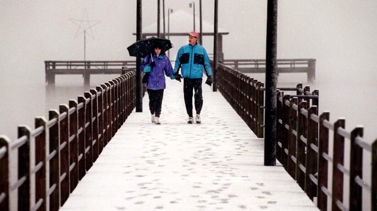 Despite being on the Coast for vacation, Neil and Cheryl Prior didn’t seem to be that bothered by the unusual snowfall on Wednesday as they looked at the beach on the Lighthouse Pier at Porter Avenue in Biloxi. The Prior’s are visiting the Coast from Edmonton, Alberta Canada. They drove to Biloxi on Tuesday night. “I woke up, looked outside and said, ‘It’s foggy outside’ then I realized that it was snow!” Neil Prior said. ‘It’s just like Edmonton!’