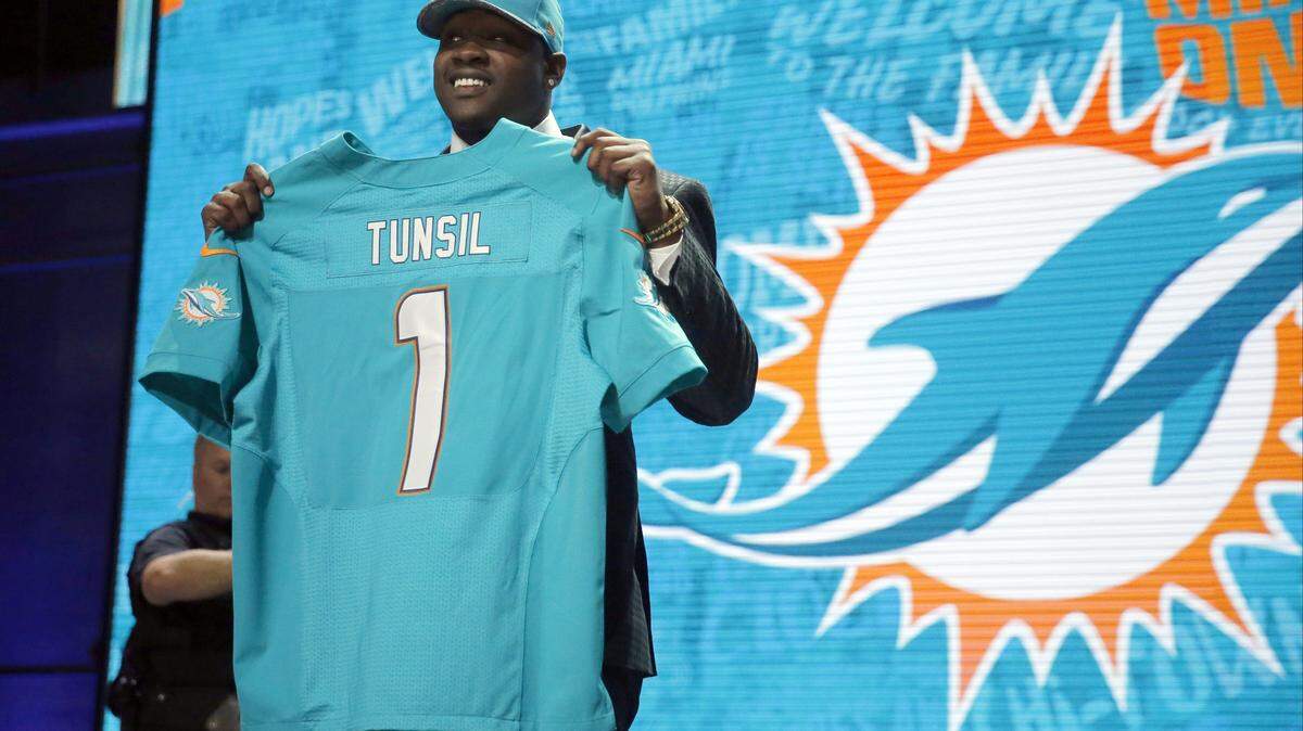 CHARLES REX ARBOGAST/ASSOCIATED PRESS 
 Ole Miss tackle Laremy Tunsil was selected by the Miami Dolphins as the 13th pick in the first round of the NFL Draft.