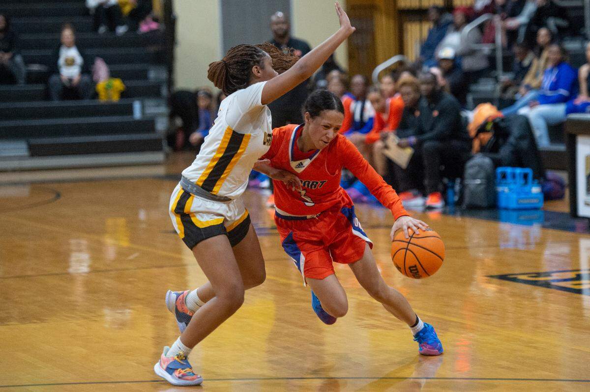 Gulfport’s Madison O’Dell retains control of the ball as she dribbles the ball down the court during a playoff game at D’Iberville High School in D’Iberville on Friday, Feb. 17, 2023.
