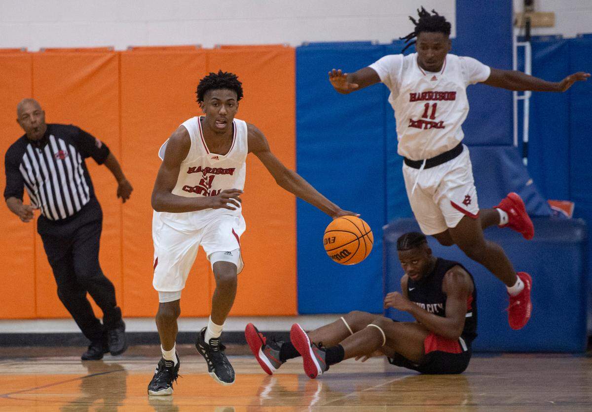 Harrison Central’s Sam Murray dribbles the ball down the court during a matchup with Yazoo City during the Adidas Holiday Classic at Gulfport High School in Gulfport on Tuesday, Dec. 28, 2021.