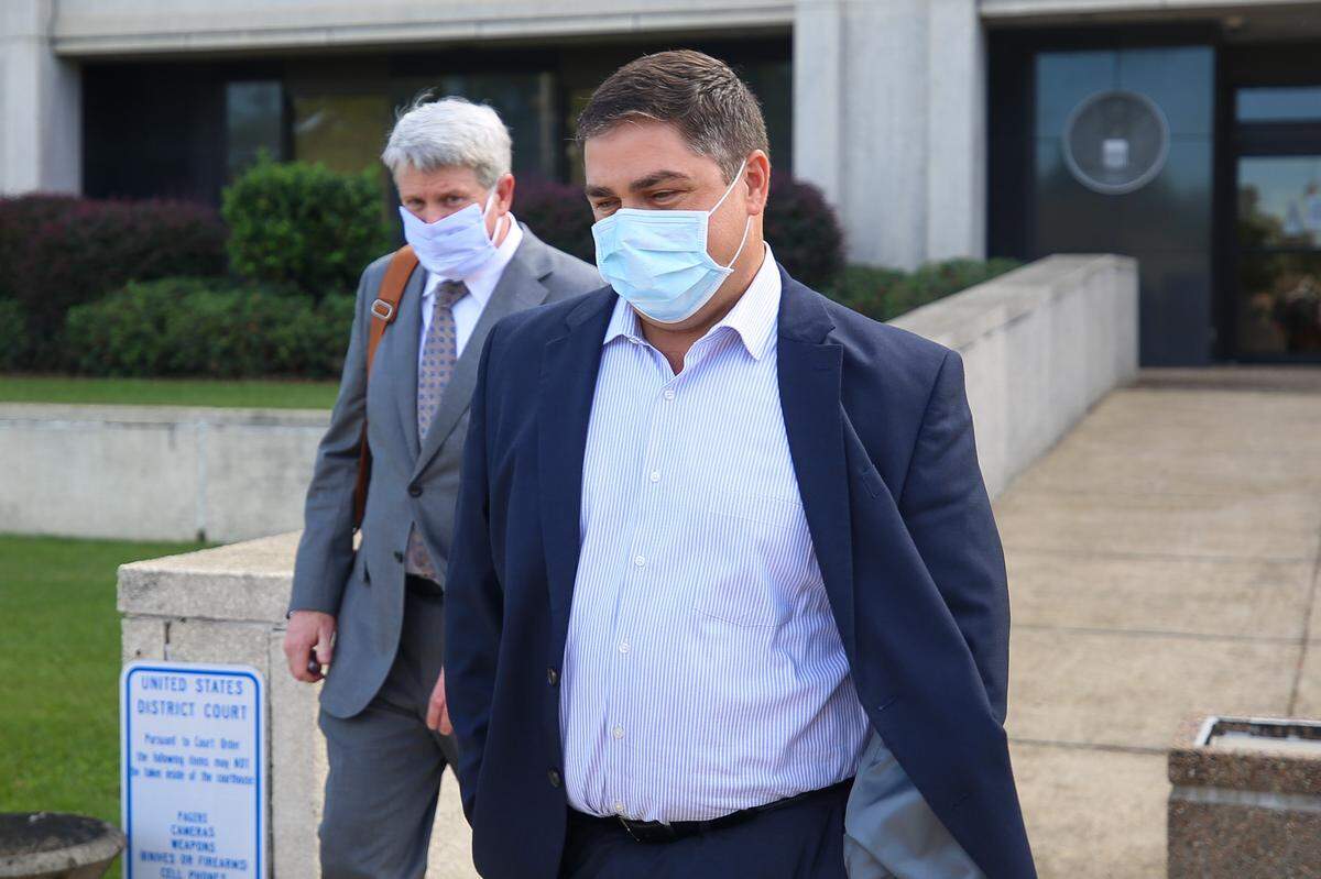 Jeffrey Rollins walks out of the William M. Colmer Federal Courthouse in Hattiesburg, Miss., Oct. 14, 2020, after pleading guilty in the TRICARE healthcare fraud scheme at Lovelace Drugs, Gardens Pharmacy on the Mississippi Gulf Coast.