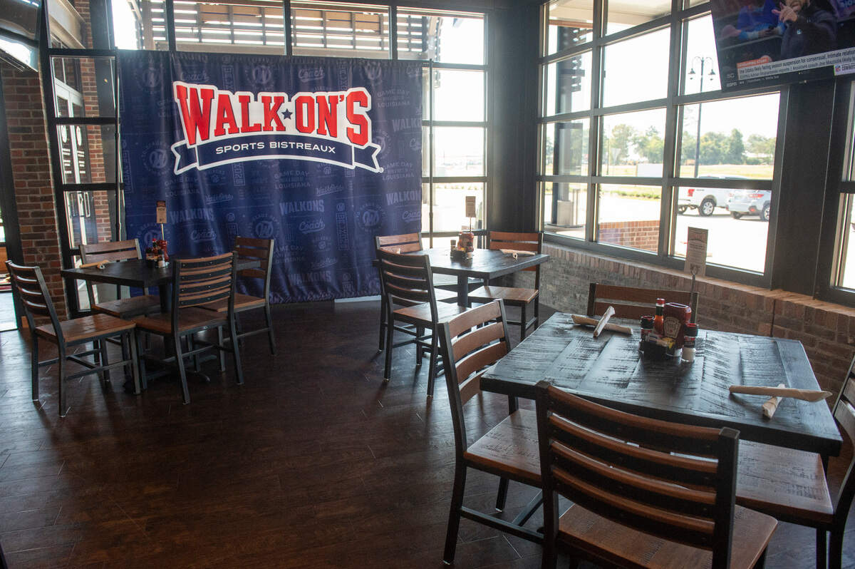 The dining area near the bar at Walk-On’s Sports Bistreaux in D’Iberville will get an official debut Sept. 26 following the ribbon cutting.