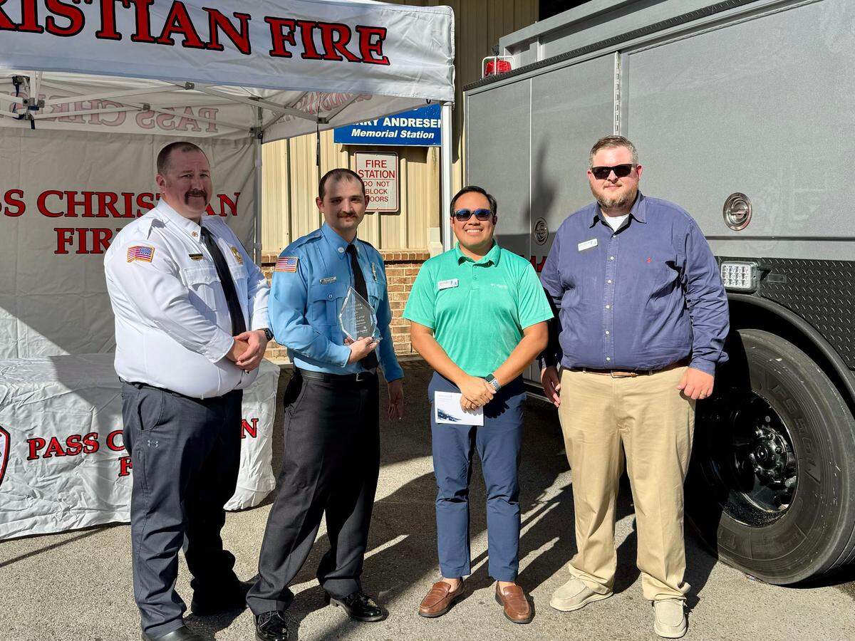 Pass Christian Fire Chief Dia’mond Woodman, Fireman Gavin Carter, Keesler Federal’s Community Development Officer Anthony Abella and Keesler Federal’s Downtown Gulfport Branch Manager Justin Redmond.