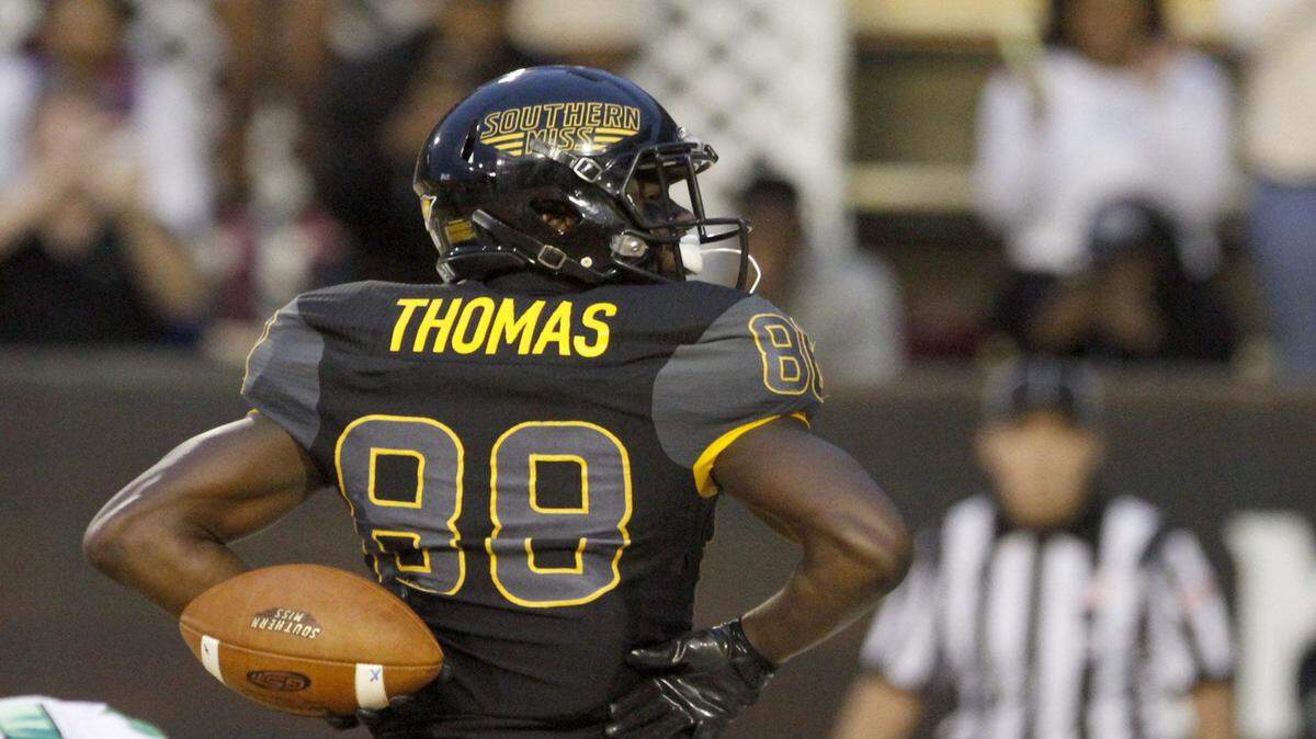 TIM ISBELL/SUN HERALD 
 Southern Miss receiver Mike Thomas strikes a pose after catching a touchdown pass against North Texas, Saturday, Oct. 3, 2015.