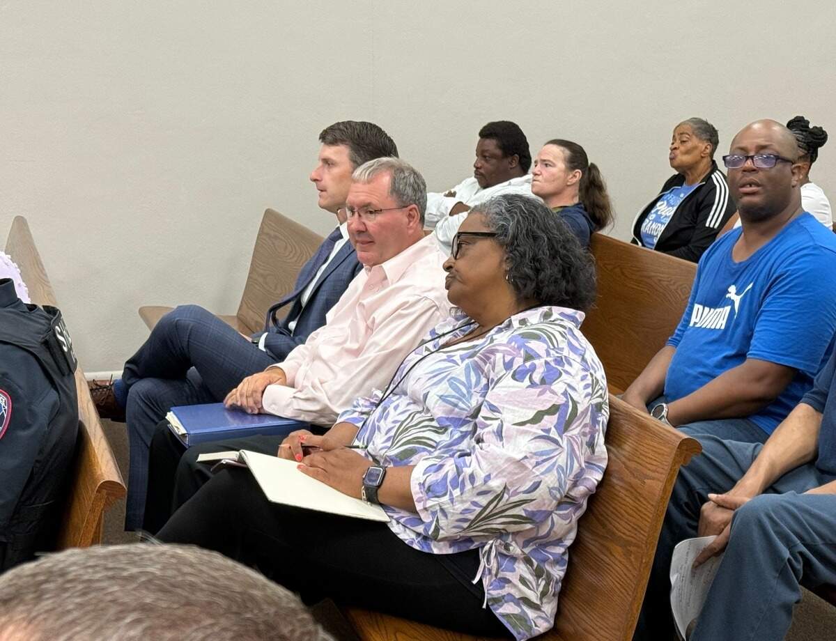 Assistant District Attorney Matthew Burrell (far left) and Alan Weatherford appear Monday, July 21, 2025, at a probation revocation hearing for Darrell Blappert Jr.