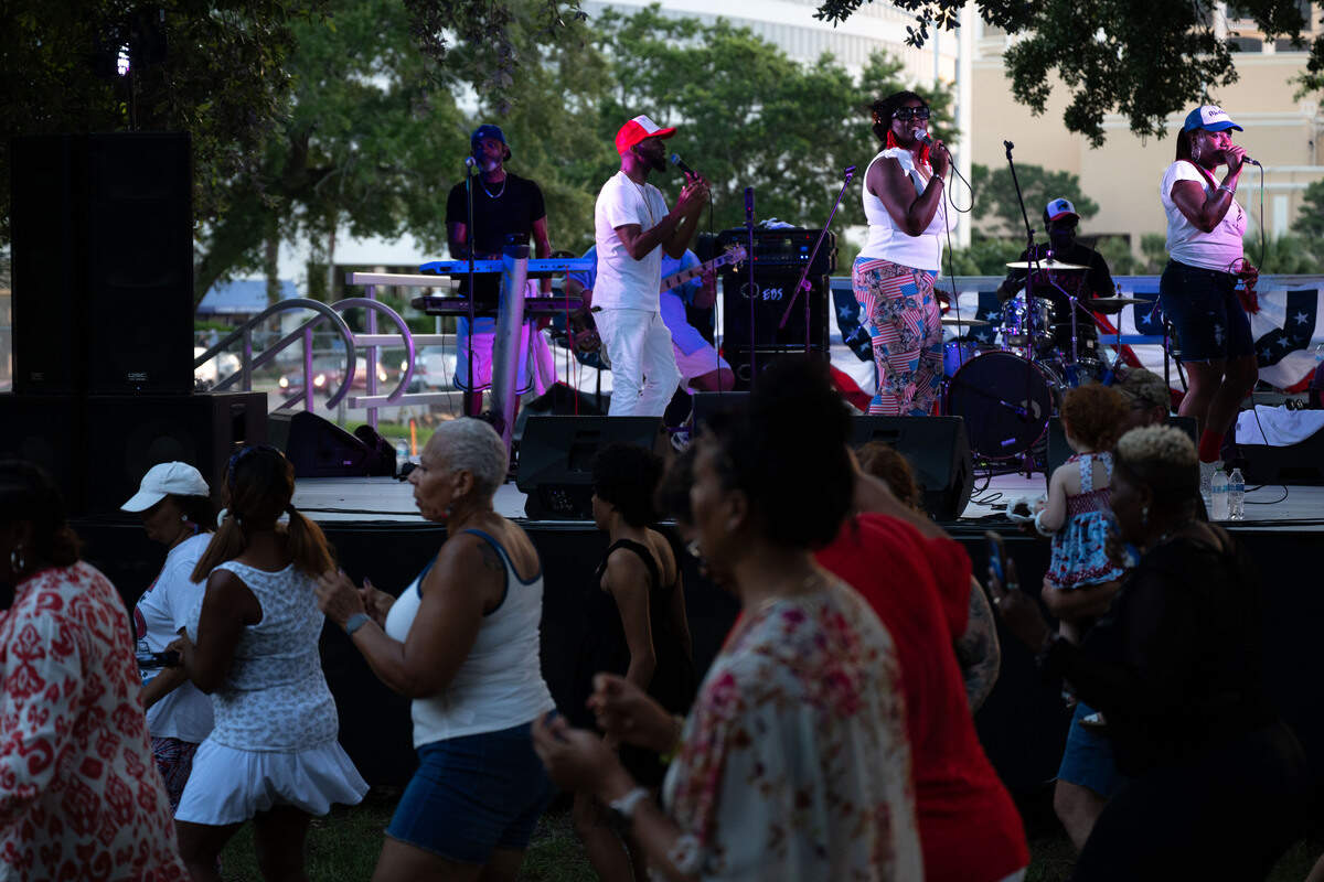 Unfazed Show & Dance leads a line dance during a Fourth of July at the Biloxi Town Green on Saturday, July 4, 2026.