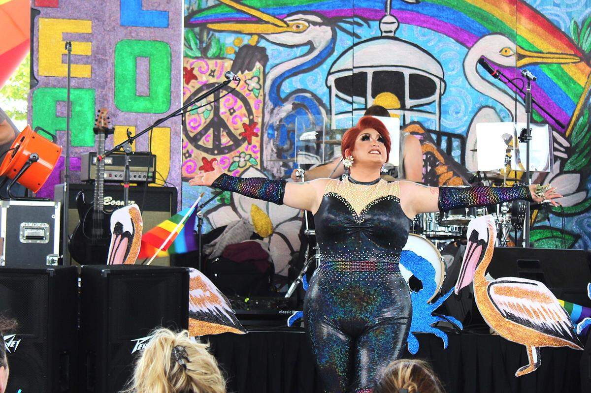 A drag queen strikes a pose after her performance during the Gulf Coast Association of Pride’s eighth annual Pride Day celebration at Point Cadet Plaza in Biloxi.