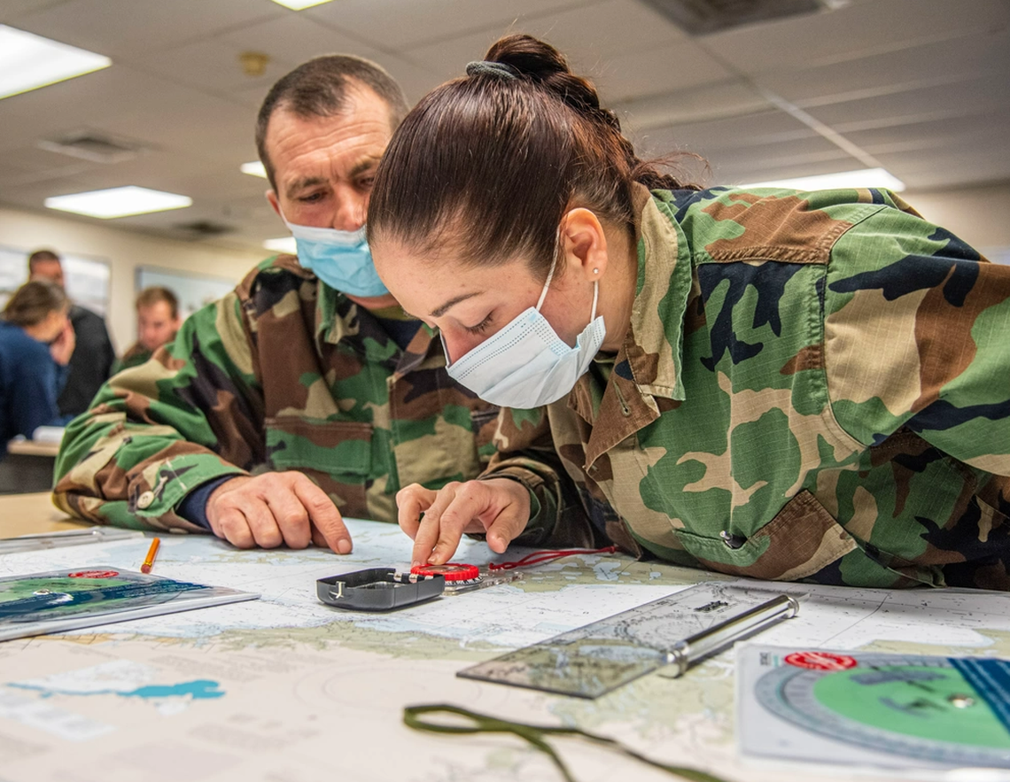 STENNIS SPACE CENTER, Miss. – International security force professionals from Ukraine plot coordinates for a Naval Small Craft Instruction and Technical Training School Patrol Craft Officer Coastal course training exercise at command headquarters located on the Stennis Space Center in South Mississippi. NAVSCIATTS Semester 22-2’s recent formal graduation ceremony featured partner nation students from the Bahamas, Czech Republic, Estonia, Germany, Jamaica, Latvia, Mauritania, Mauritius, Poland, the Republic of Korea, Romania, and Ukraine. NAVSCIATTS is a security cooperation schoolhouse operating under U.S. Special Operations Command in support of foreign security assistance and geographic combatant commanders’ theater security cooperation priorities. (U.S. Navy photo by Michael Williams)