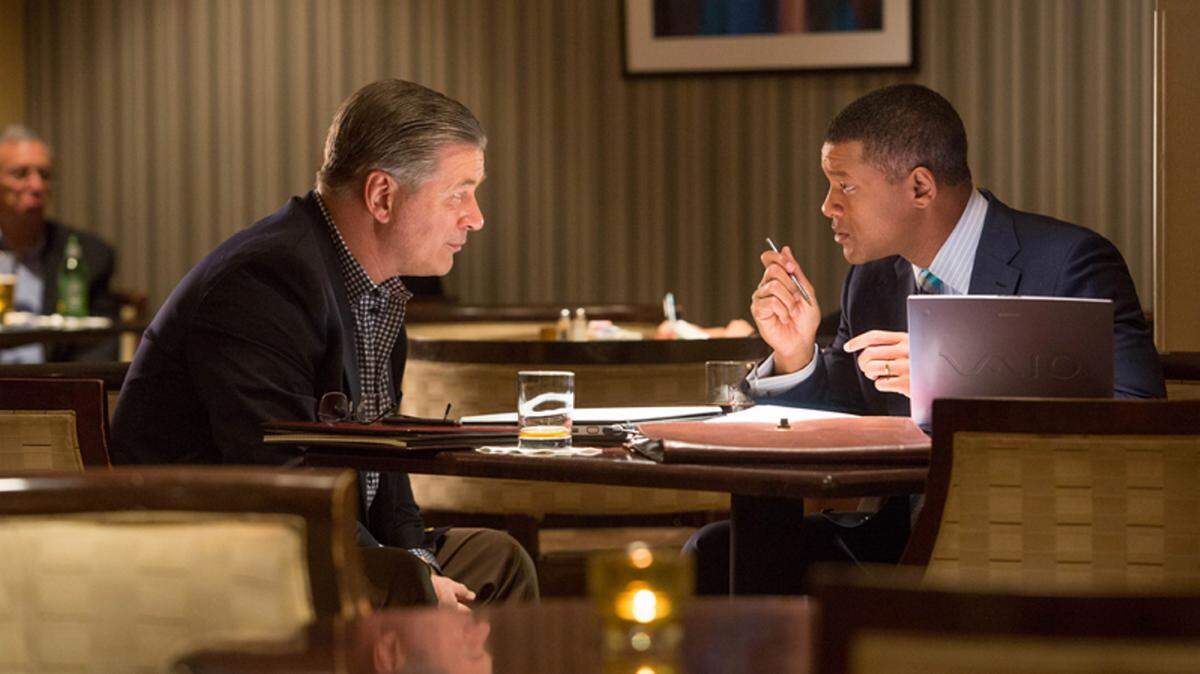 COLUMBIA PICTURES INDUSTRIES INC.Alec Baldwin and Will Smith star in 'Concussion.' Smith plays Dr. Bennet Omalu and Baldwin plays Dr. Julian Bailes.