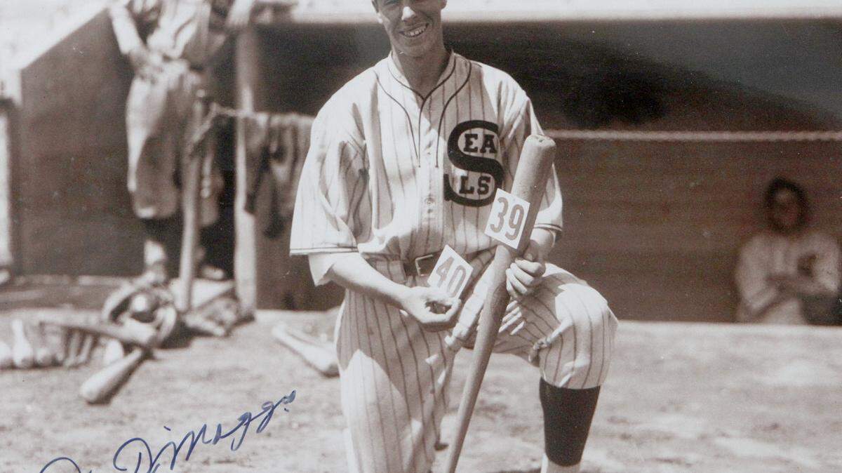 TIM ISBELL/SUN HERALD 
 Joe Dimaggio poses with his bat. Memorabilia such as this can been seen in Our Love Affair with Baseball exhibit in Biloxi.