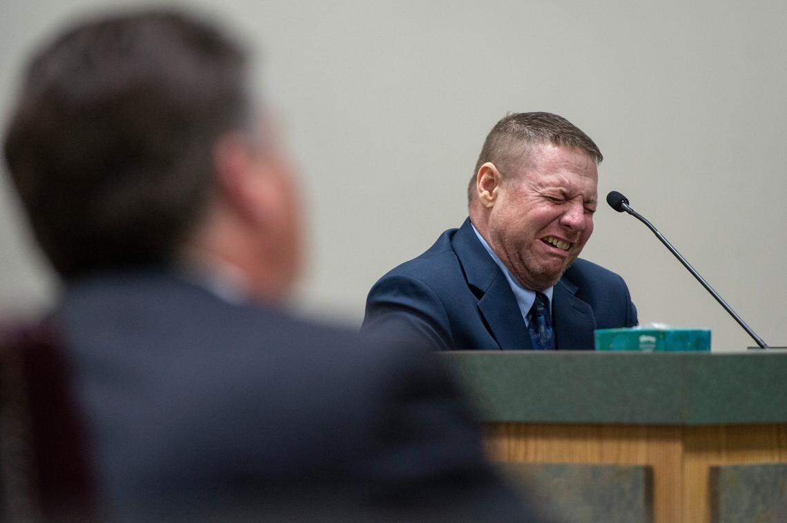 Jacob Blair Scott, who is accused of sexually assaulting a minor, cries out while on the witness stand after testifying about his family relationships after being asked an unrelated question during his trial in Jackson County Circuit Court in Pascagoula on Wednesday, June 1, 2022.