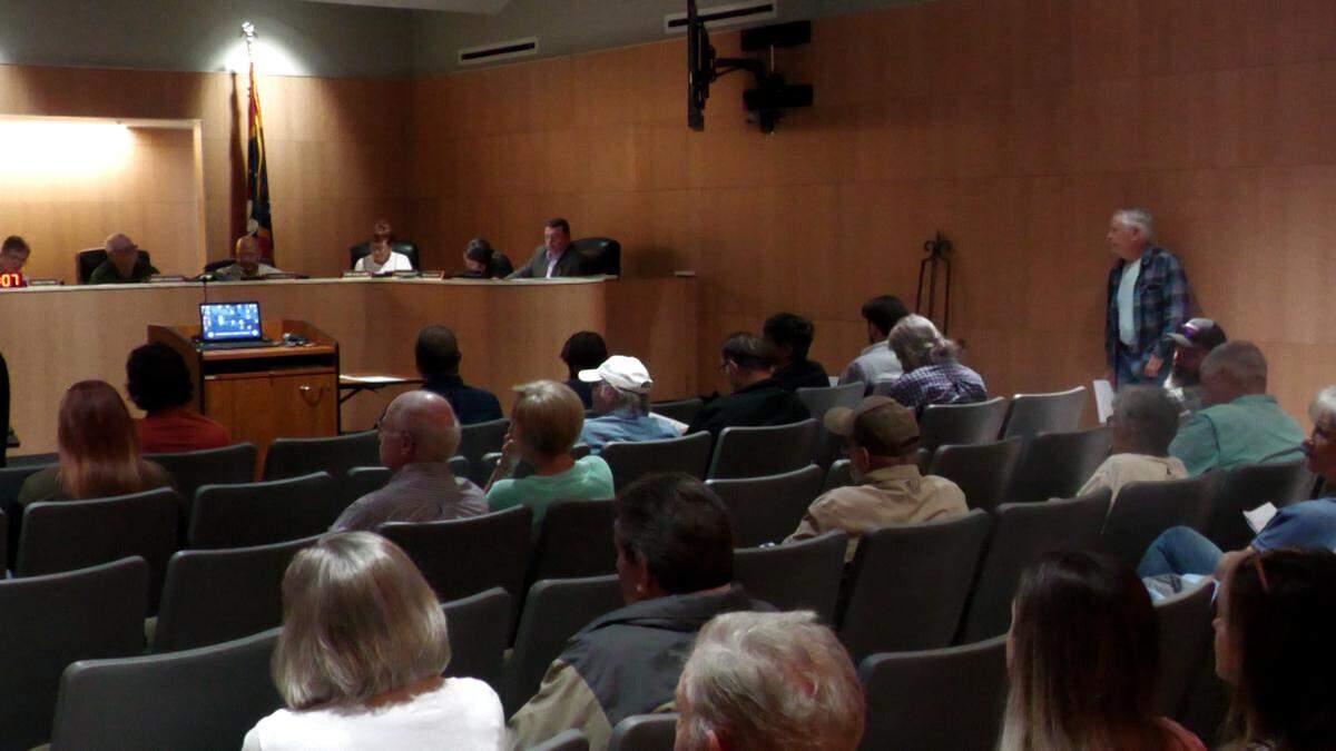Community members attend a Jackson County Board of Supervisors meeting to voice concerns about a proposed rezoning request. Many residents worry the new development could alter the rural character of their neighborhood.