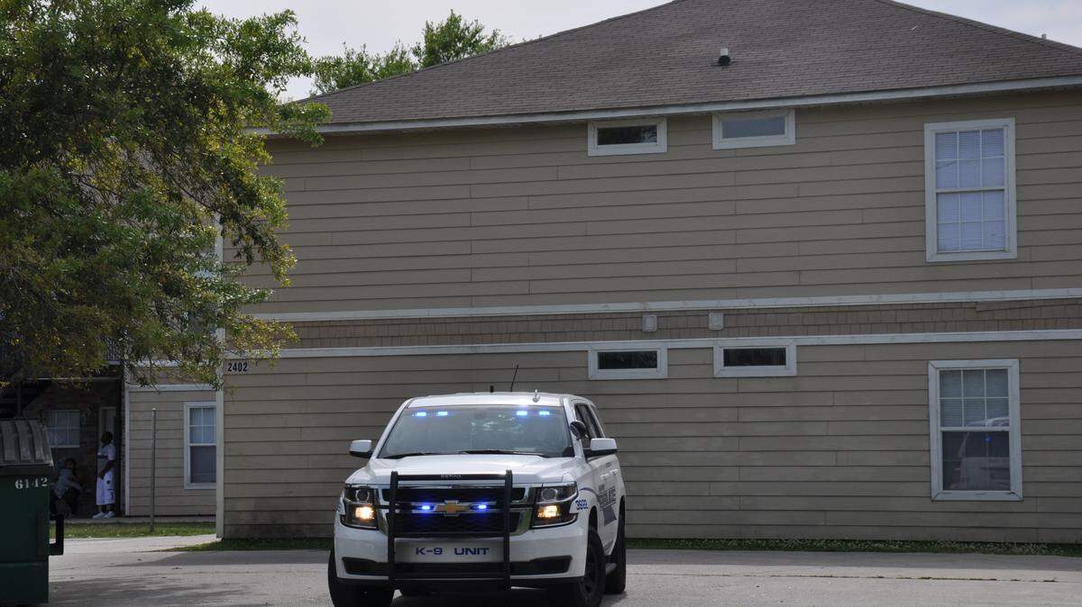 Gulfport police leave Dolan Commons on Saturday afternoon after a man was found with a gunshot wound near the apartment complex.