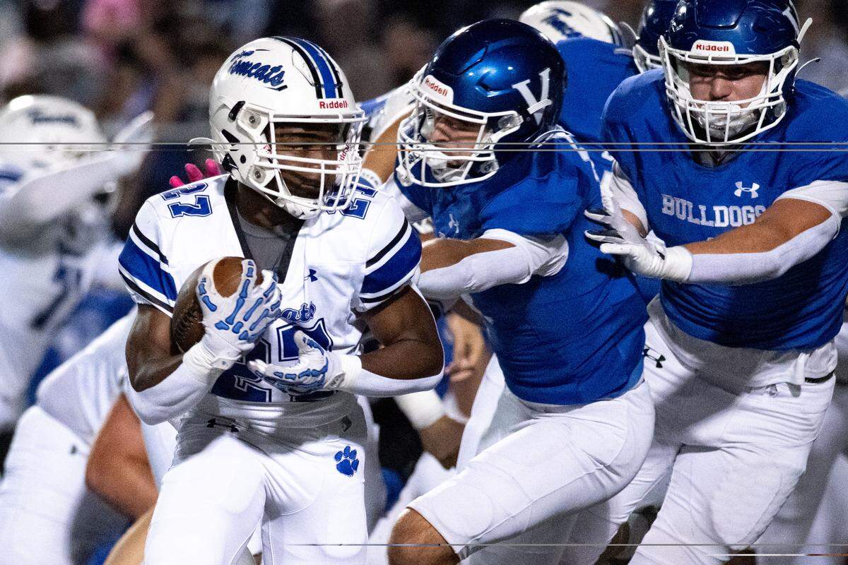 Stone running back Amarion Fairley (27) looks for room to run Friday against Vancleave.