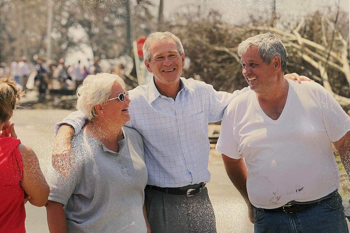 Sandra Patterson, left, and husband Lynn Patterson, now deceased, are pictured with President George Bush in East Biloxi on Sept. 2, 2005. Bush kept in touch and visited them with the first lady on the first anniversary of Katrina, when they had rebuilt their home. Sandra Patterson still owns their business, Patterson Plumbing, which was also destroyed.