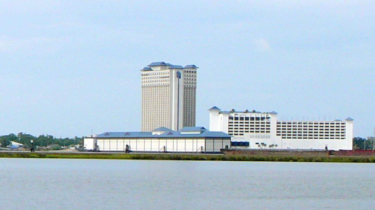 MARY PEREZ/SUN HERALD 
 The IP Casino Resort barge, the low building at the center of the picture, before it was raised and placed on steel and concrete piers to make it easier to maintain and extend the structure's life by as much as 40 years. The project won a national award for its engineering.
